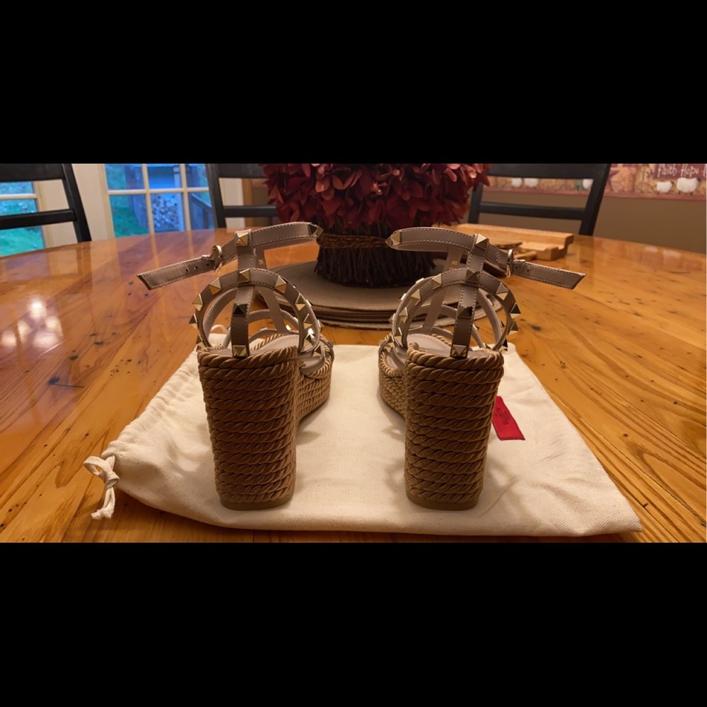 Valentino shoes size 38(8) never worn. Comes with the bag and Valentino box.